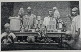 Men in the Belgian Congo canning tropical fruit
