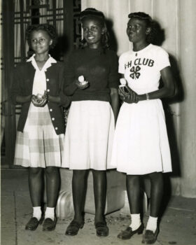 The Negro 4-H Club girls who received the State Fair of Texas Honor Awards at the Dallas Fair, October 13, 1947, are (reading from left to right) Willie Mae McDaniel, Jefferson County; Maxine Harris, Caldwell County; and Gladys Harrison, Smith County.; 7X9