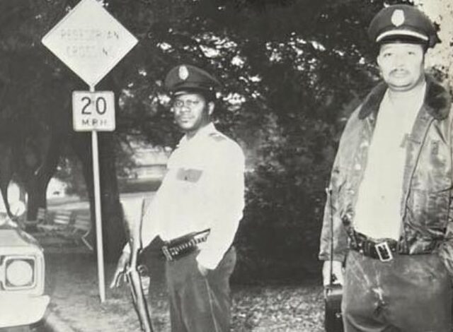 Two police officers on PVAMU campus after the uprising in February 1971