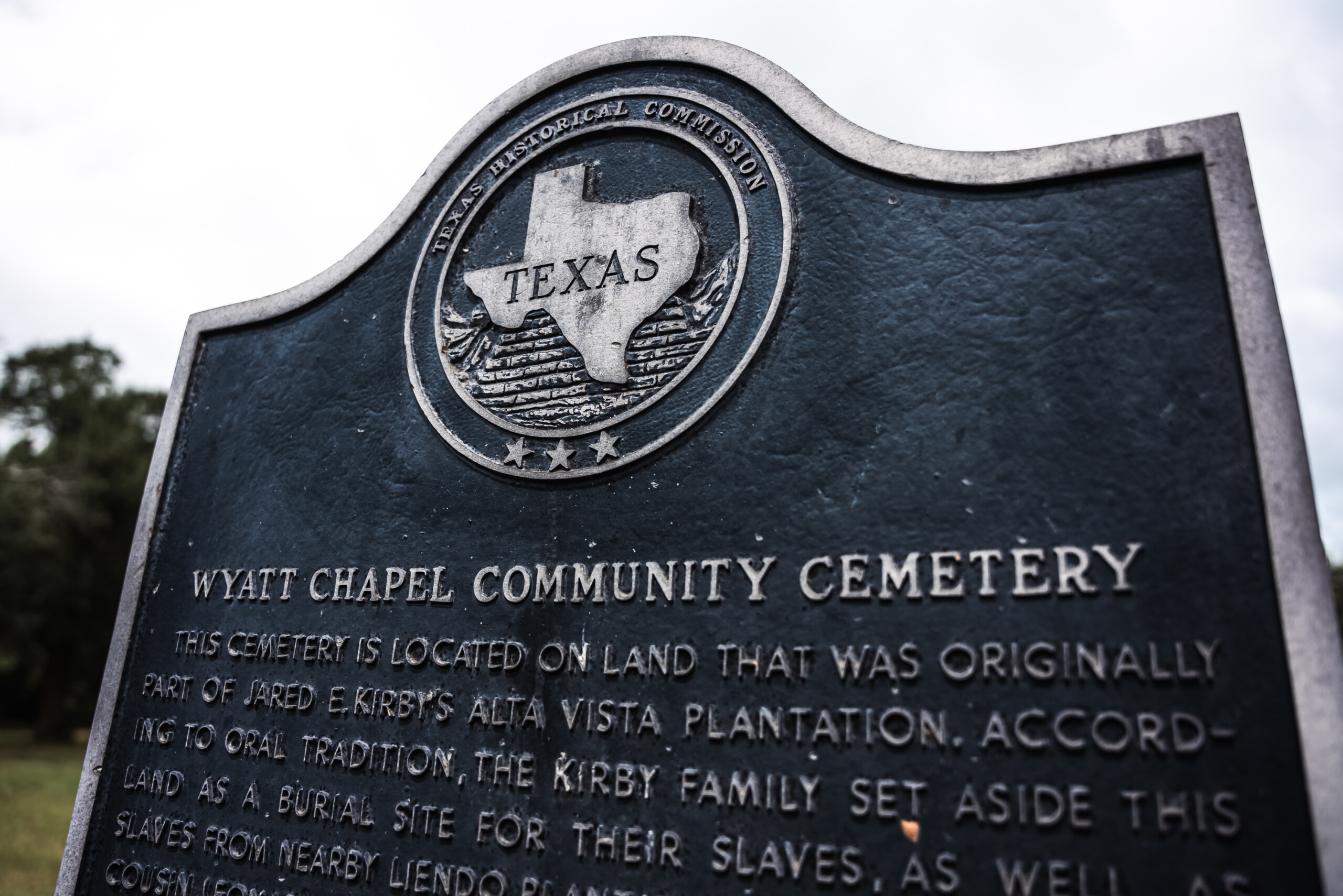 The Texas state historical marker for Wyatt Chapel Community Cemetery