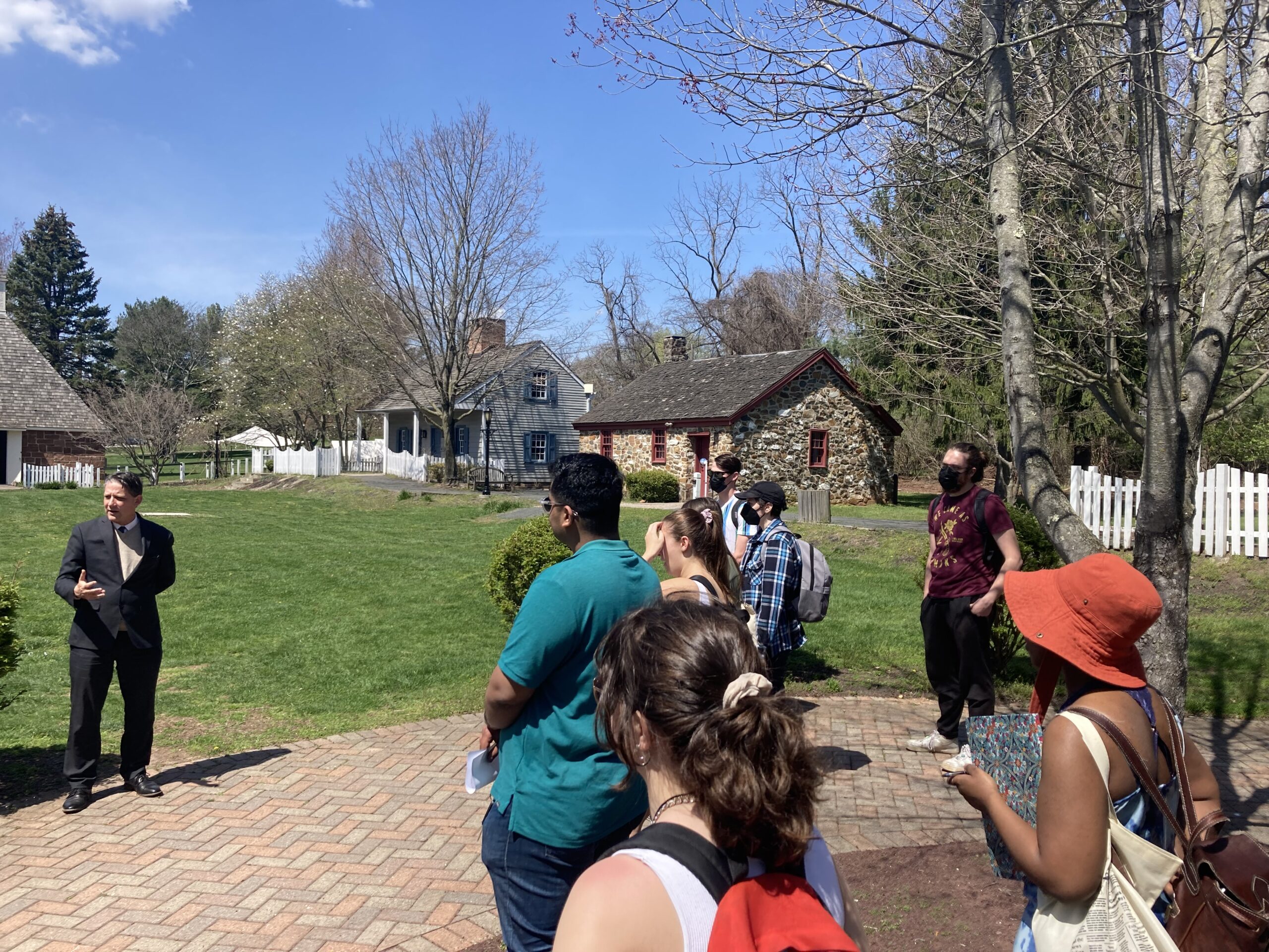 Tour guide Malcom Walls explains to visitors why the Old Camberbatch Historic District is not really so boring. [Photograph © 2023 unidentified]