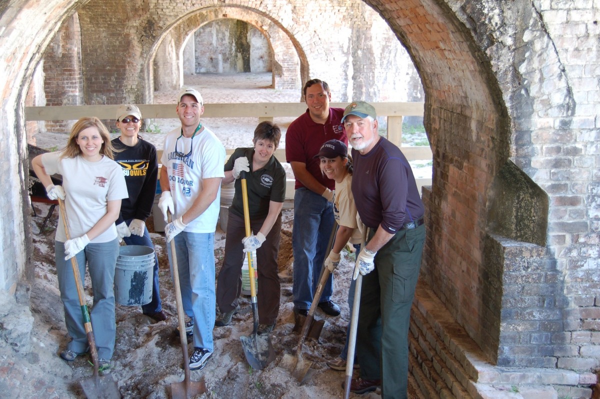 A team of historians collaborating to refine and enhance the integrity of their ongoing project. [Photograph © 2024 unidentified]