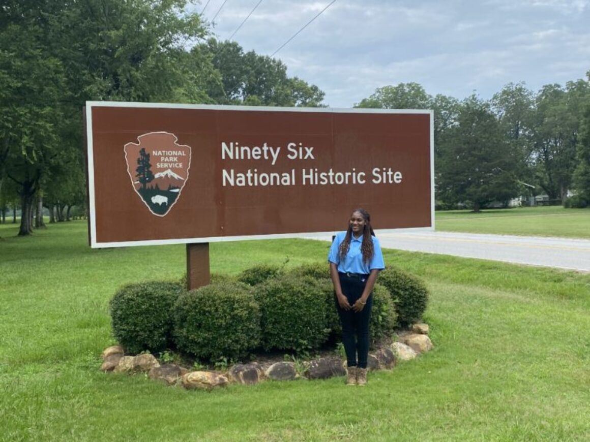 Intern, Ocean Dunbar standing next to Ninety Six National Park, in South Carolina. 2023