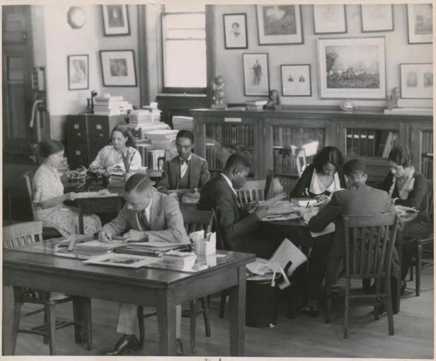 Researchers using the Schomburg Collection, when it was the 135th Street Branch Library Division of Negro Literature, History and Prints, in 1938. Photographs & Prints Division, Schomburg Center for Research in Black Culture, NYPL.